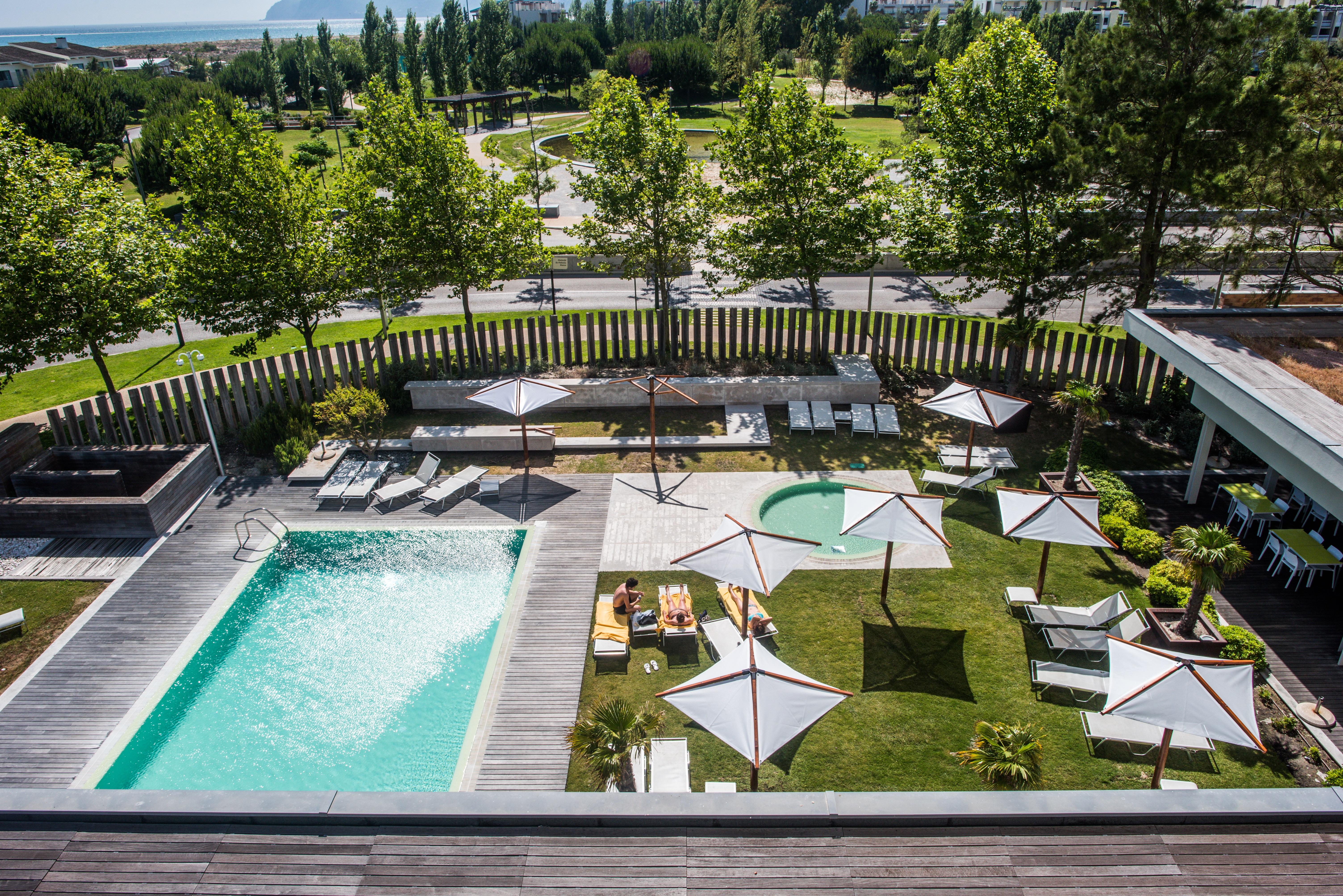The Editory By The Sea Troia Comporta Hotel Exterior photo The swimming pool at the hotel